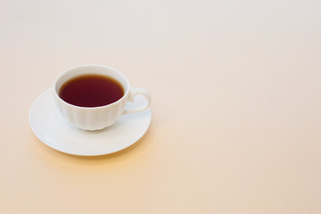 Cup of tea on light background