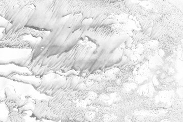 Grunge white ink texture with abstract washes and paint stains on the white paper background.