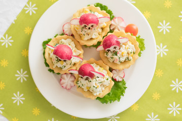 children's food, funny tartlets in the form of animals. Children's menu on a green background