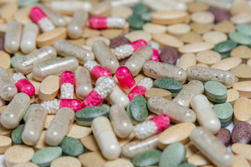 Obraz na płótnie Canvas heap multicolored of pills