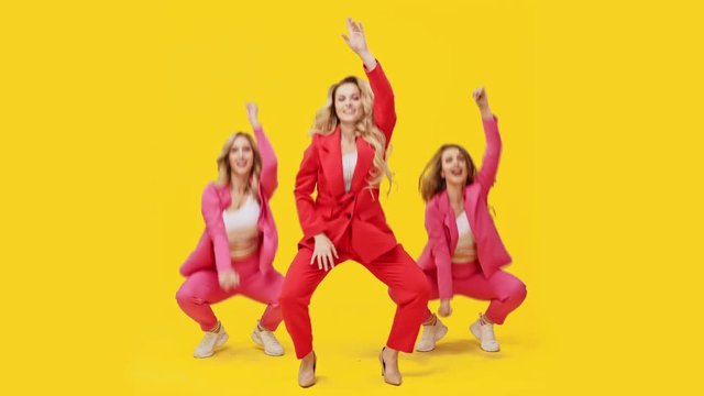 Attractive ladies in pink doing a dance routine