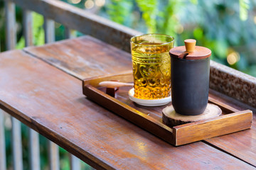 Cup of Coffee and Water in Nature Coffee Shop Thailand