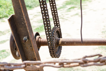 Old rusty sea winch on the shore