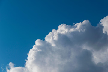 Obraz premium white fluffy clouds in blue sky