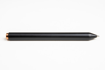A close-up product shot of a sleek black barrel clicker ballpoint pen set on a plain white background.