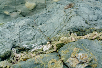 Background with green mineral rock close up, gemstone texture, olivine, amazonite, amphibolite