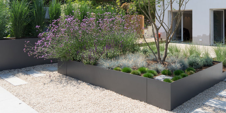 Moderne Gartengestaltung mit Gr&auml;sern und Stauden