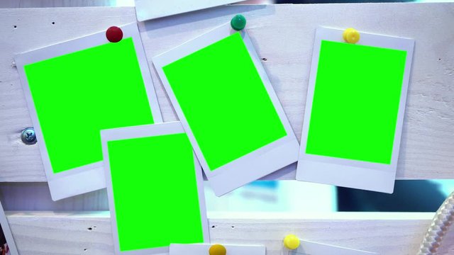 The photo. Photo frame with green background. Hromakey. Green screen. Photos attached to wooden boards. Memory. Story. Family photos. A party