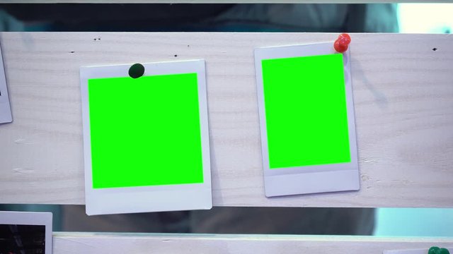 The photo. Photo frame with green background. Hromakey. Green screen. Photos attached to wooden boards. Memory. Story. Family photos. A party