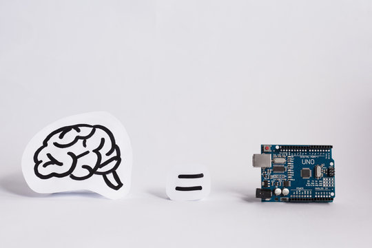 Arduino Uno. Micro controller. Technology. Electronic computing machine. Concept. High intelligence. Brain. The science. White background.