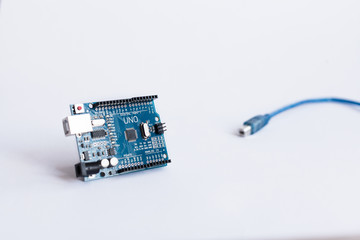  Arduino Uno. Micro controller. Technology. Electronic computing machine. Concept. High intelligence. STEM education for children and teenagers, robotics and electronics. DIY. AI.