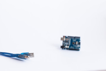 Arduino Uno. Micro controller. Technology. Electronic computing machine. Development platform connected to PC with a USB cable. Concept. High intelligence. STEM education