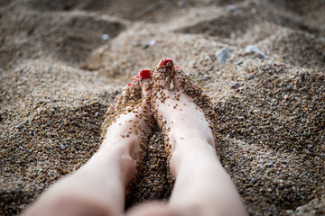feet in the sand