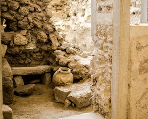 AKROTIRI, SANTORINI - DEC 2, 2018 - Tourists exploring the ancient ruins of Akrotiri, Santorini,...