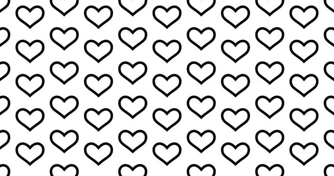 Heart outline icons background clip motion backdrop video in a seamless repeating loop.  Black & white love themed hearts pattern background high definition motion video clip