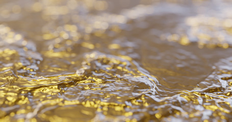Abstract gold liquid with reflections. Golden wave and ripple background. Lava, caramel, amber, honey, oil texture. 3D render