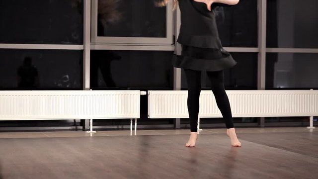 Amazing emotional dancing performance of graceful girl. She is moving her body