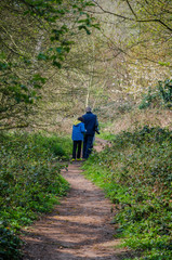 A family on a walk along country lanes at th evillage of Perton near Wolverhampton in South Staffordshire, UK