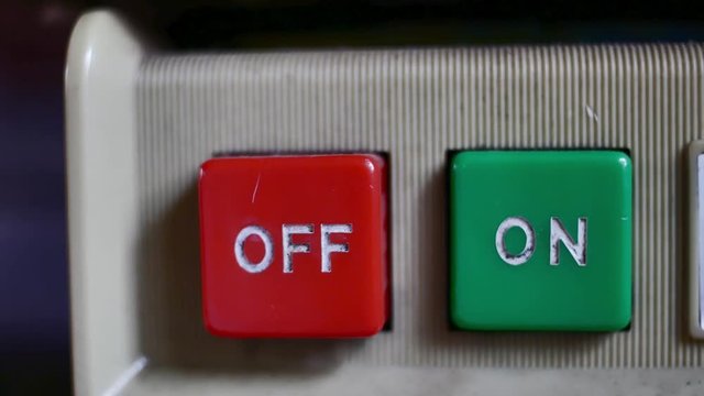 red power button on black background