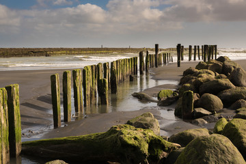 Ruins of Patea Pier at the mouth of the inlet