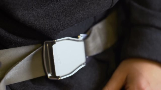 Male lacing up belt, military man preparing for speed march, touristic equipment