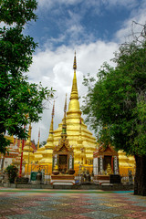 Naklejka premium Image of golden pagoda is located in the temple in bantak District. Buddhist temple in Thailand.