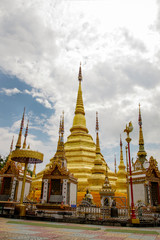 Image of golden pagoda is located in the temple in bantak District. Buddhist temple in Thailand.