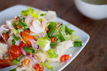 Spicy salad seafood with squid shrimp salad