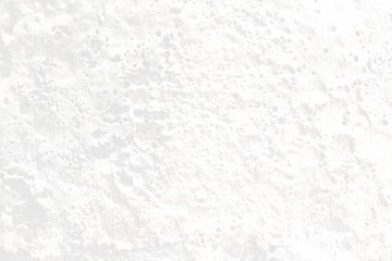 White textured wall background.