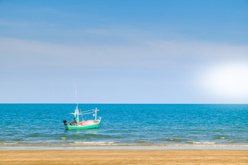 Fototapeta premium Abstract beach background. Yellow sand, blue sky and calm tropical beach landscape.Exotic nature concept.Location Satheep Thailand