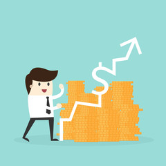 Business man with golden coin and increase graph.investment concept.