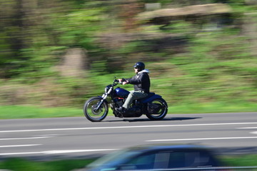 european bikers on their bikes on a sunny day with blurred background