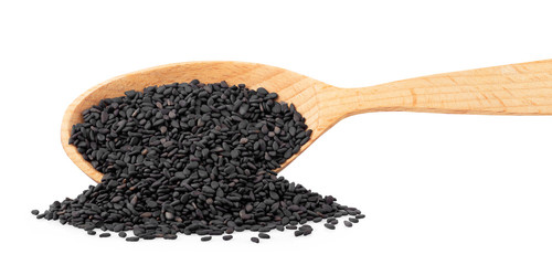 black sesame seeds in spoon