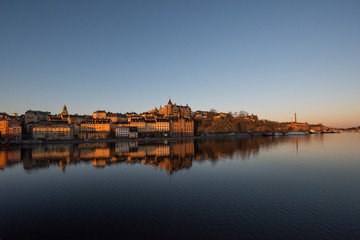 View over old houses in the Södermalm district a spring day at sunrise in Stockholm from the Riddarholmen island