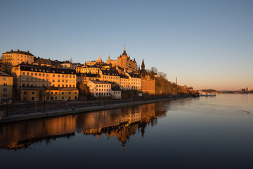 View over old houses in the Södermalm district a spring day at sunrise in Stockholm from the Riddarholmen island