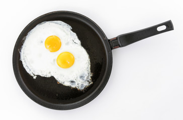 fried egg in a frying pan