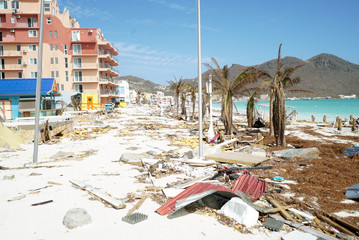 Philipsburg Sint maarten: Board walk and buildings completely covered with beach sand and debris...