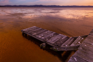 A large tidal lake at sunset.