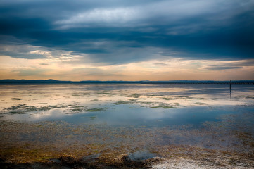 A large tidal lake at sunset.