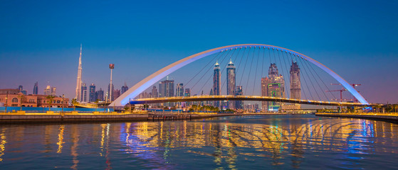 Fototapeta na wymiar Dubai city skyline at night. view of Tolerance bridge