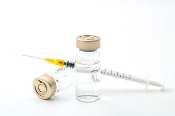 Vaccines, botulinum toxin and insulin ampules concept theme with glass vials with clear liquid next...