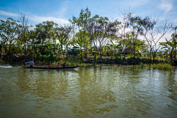 Fototapeta na wymiar Strolling by boat in Inle Lake, Myanmar.