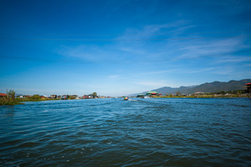Fototapeta premium Strolling by boat in Inle Lake, Myanmar.