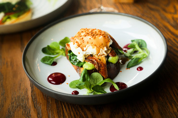 Poached egg on toast with eel