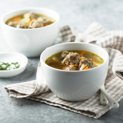 Homemade soup with meatballs