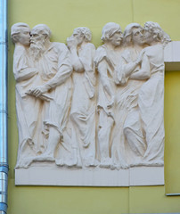 Fragment of the sculptural frieze on the former apartment house of Hermann Broido. Date of construction 1907. Architect Nikolay Zherikhov. Russia, Moscow, April 2019.