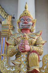 The Demon Guardian statue at the gate of the temple in Thailand.