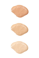 Foundation different shades on a white background - isolate