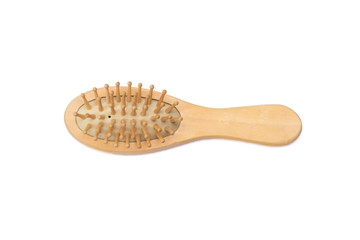 Wooden massage comb on a white background - isolate