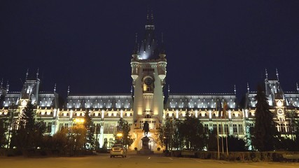 Fototapeta na wymiar Lighted Palace of culture in the night , romania, symbol of moldovia